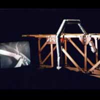 Serpentine robot inspecting a simulated bridge truss